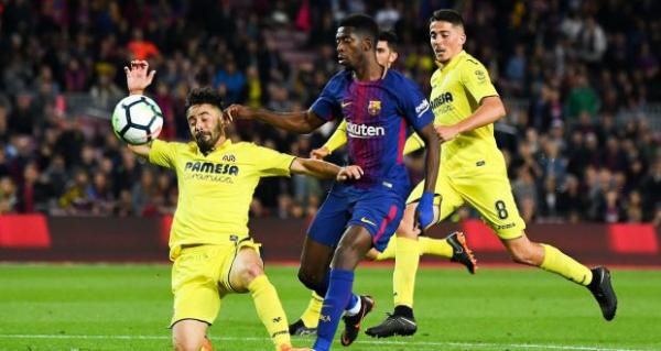 مدافعو برشلونة يعدون فريقه إلى صدارة الدوري الاسباني